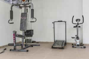 a gym with several exercise bikes in a room at Hotel Acantilado in Las Grutas