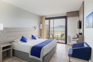 Postel nebo postele na pokoji v ubytování Best Western Plus San Damianu
