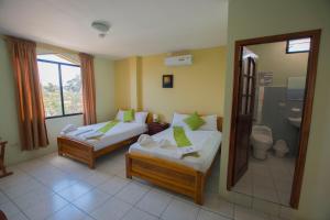 Voodi või voodid majutusasutuse Hostal Andry toas