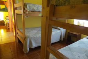 Postel nebo postele na pokoji v ubytování Cabañas Peretei