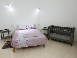 Tempat tidur dalam kamar di Menzel Rayan