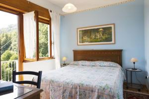 Posteľ alebo postele v izbe v ubytovaní Casa Bougainville