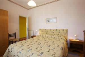 Posteľ alebo postele v izbe v ubytovaní Casa Bougainville