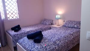 Posteľ alebo postele v izbe v ubytovaní Costa del Sol Manilva Playa Spa + 23 fotografií