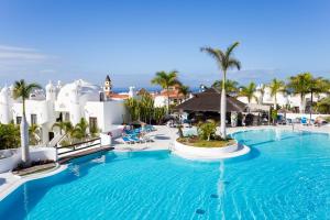 an image of a swimming pool at a resort at EDEN RENTALS Duplex Adeje Palace in Playa Paraiso