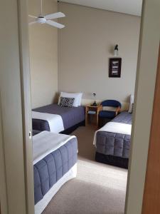 Un pat sau paturi într-o cameră la 299 On Devon West