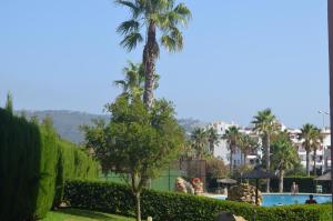 Swimmingpoolen hos eller tæt på BONITO ÁTICO AIRE ACONDICIONADO y BARBACOA