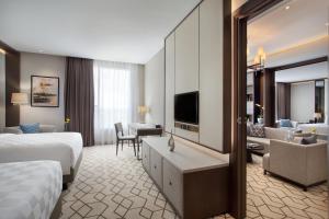 TV a/nebo společenská místnost v ubytování Wyndham Opi Hotel Palembang