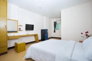Postel nebo postele na pokoji v ubytování City 1 Residence + 17 fotografií