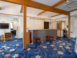 a view of the lobby of a hotel as we were waiting at Hotel Bliss Villa Hasami in Hasami