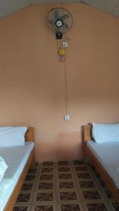Postel nebo postele na pokoji v ubytování peace guesthouse cottage