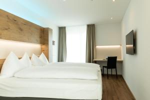 Katil atau katil-katil dalam bilik di TRIP INN JET HOTEL Zürich Airport