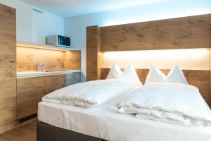 Кровать или кровати в номере Jet Hotel Zurich Airport