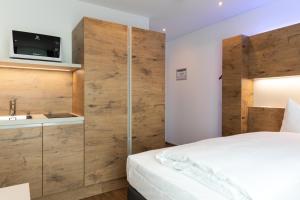 Katil atau katil-katil dalam bilik di TRIP INN JET HOTEL Zürich Airport