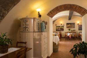 Un restaurante o sitio para comer en Agriturismo Al Picchio