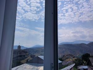 a window with a view of the mountains at Hotel Beni in Akhaltsikhe