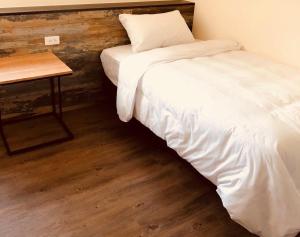 Postel nebo postele na pokoji v ubytování Tropical Fish B&B