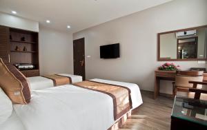 TV a/nebo společenská místnost v ubytování Victor Hanoi Hotel