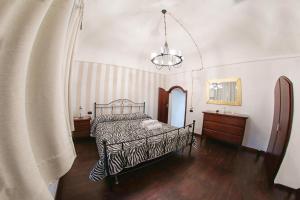 Posteľ alebo postele v izbe v ubytovaní Al Vecchio Cellaio Historical Guest House