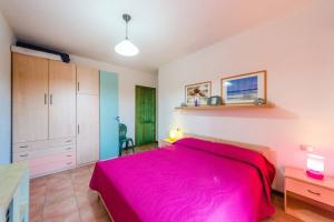 A bed or beds in a room at Casa Vacanze Pas
