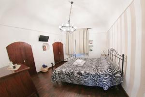 Posteľ alebo postele v izbe v ubytovaní Al Vecchio Cellaio Historical Guest House