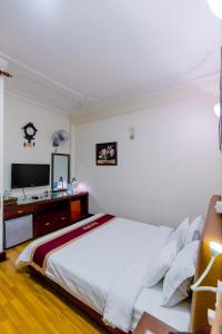 Giường trong phòng chung tại A25 Hotel - 45B Giảng Võ