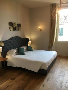 Voodi või voodid majutusasutuse Hotel St. James toas