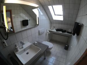 Kúpeľňa v ubytovaní Hotel Landgasthaus Schäferhof