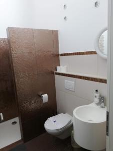 Ein Badezimmer in der Unterkunft Villaci Business Apartments