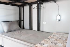 Postel nebo postele na pokoji v ubytování Iris Hostel