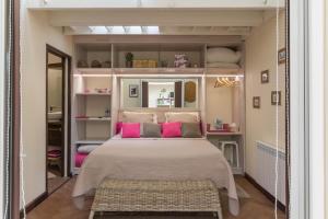 Ένα ή περισσότερα κρεβάτια σε δωμάτιο στο L'ISLE DE FRANCE