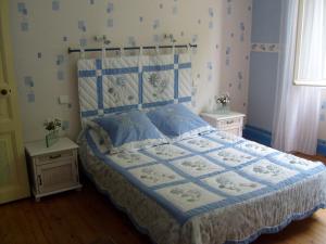 Ένα ή περισσότερα κρεβάτια σε δωμάτιο στο Maison Confortable WI-FI Animaux oui