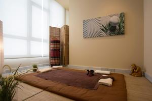 a room with a large rug on the floor at Hipotels Playa La Barrosa - Adults Only in Chiclana de la Frontera