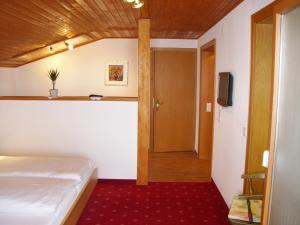 Postel nebo postele na pokoji v ubytování Haus Helga