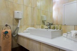 A bathroom at Gaia Royal