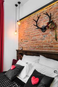 Łóżko lub łóżka w pokoju w obiekcie Wooden Horse - New Apartment - Old Town
