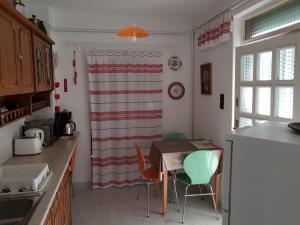 A kitchen or kitchenette at Judita Apartments
