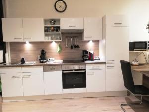 Kuchyň nebo kuchyňský kout v ubytování Ferienwohnung Einbeck FeWo B Nolte