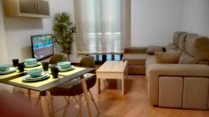 Posedenie v ubytovaní Apartamento Santa Faz