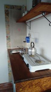 Nhà bếp/bếp nhỏ tại La Cima Alta Gracia +3 ảnh