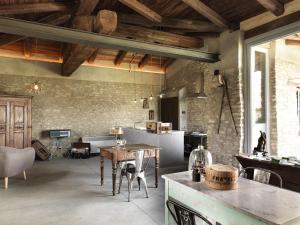 A kitchen or kitchenette at Cascina Facelli - Luxury Country House
