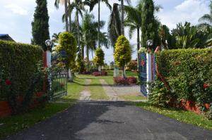 Κήπος έξω από το Finca Hotel Pueblito Quindiano