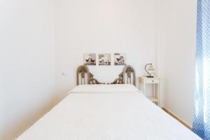 Posteľ alebo postele v izbe v ubytovaní Bonito apartamento en campo de golf con piscina