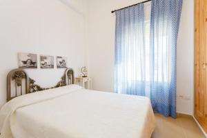 Posteľ alebo postele v izbe v ubytovaní Bonito apartamento en campo de golf con piscina