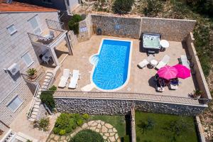 Bazén v ubytovaní Paradis Apartments alebo v jeho blízkosti