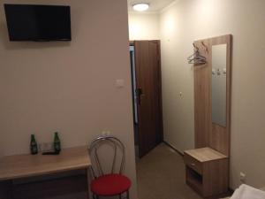TV a/nebo společenská místnost v ubytování Hotel Nowostawy A2 MOP