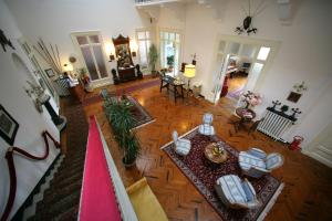 an overhead view of a living room with a table at Hotel La Vela-Castello Il Rifugio in Santa Margherita Ligure