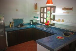 Nhà bếp/bếp nhỏ tại Manala Hotel
