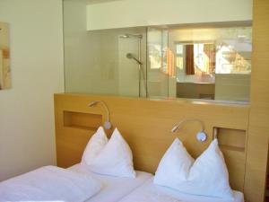 Postel nebo postele na pokoji v ubytování Haus Helga