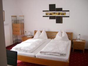 Postel nebo postele na pokoji v ubytování Haus Helga